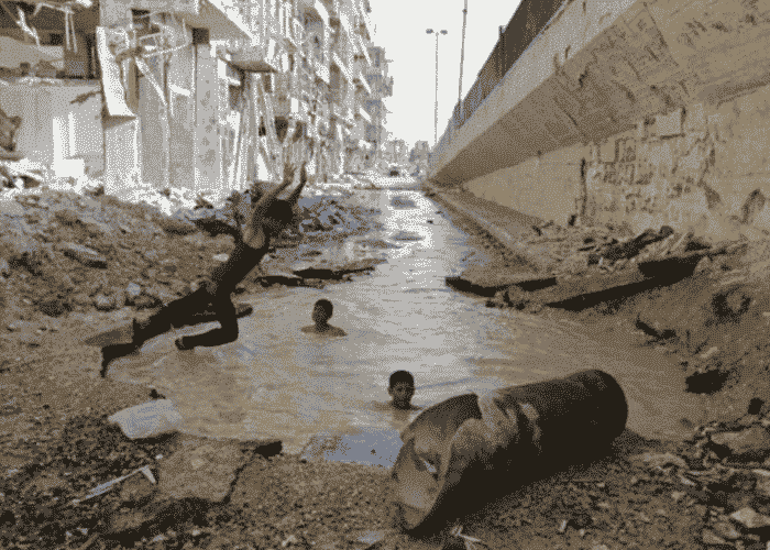Children Aleppo puddle
