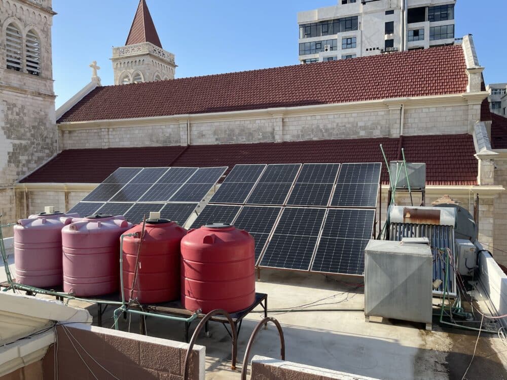 Solar panels and water tanks.